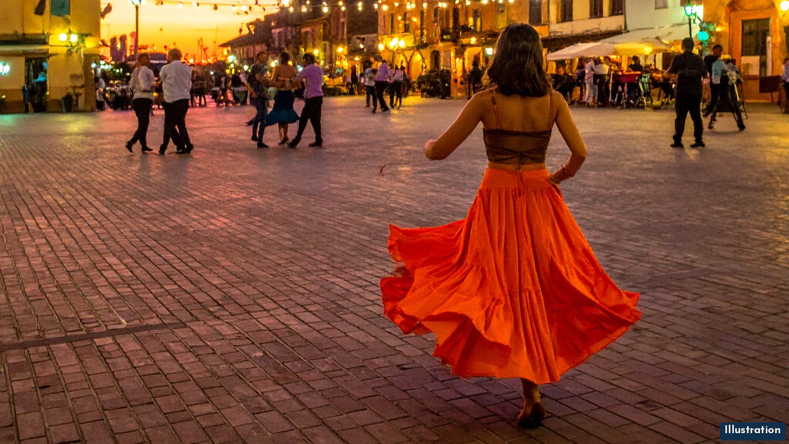 Illustration: a dancer in a flowing orange skirt, seen from behind mid-turn, on a brick city plaza at dusk under strings of café lights, with couples dancing in the distance and the sunset glowing behind the buildings.