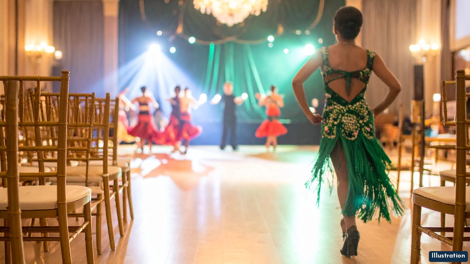 Illustration: a Latin dancer in an emerald green fringed dress, seen from behind, walks toward a bright competition dance floor where couples in red Latin costumes dance under green and white stage lights, with chandeliers above and rows of gold chairs on both sides.